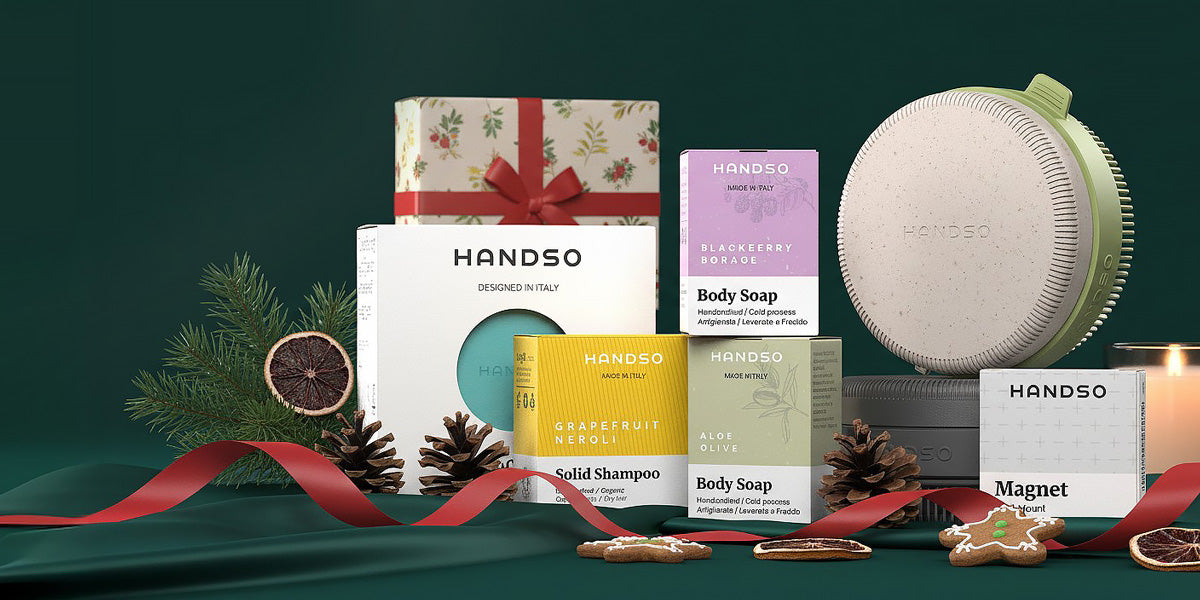 HANDSO product lineup including a solid shampoo, body soap, and magnet on a green background with decorative ribbons.